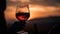 Romantic silhouette holding wineglass, enjoying sunset at vineyard celebration generated by AI