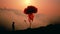 Romantic Silhouette Of Man With Poppy: A Captivating National Geographic Style Photo