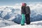 Romantic snowboarder couple embracing on snow. Alps mountain range background