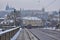 Romantic Snowy Prague gothic Castle with the Charles Bridge, Czech Republic