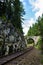 Romantic stone bridge over railway in beautiful forest, Czech republic