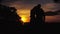 Romantic sunset. Couple man and woman love each other. Love story.Silhouettes of people against