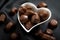 Romantic sweet gifts for Valentine`s Day concept with close up on a heart shaped box filled with praline chocolates or chocolate