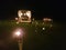 Romantic terrace with torches in a field