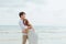 Romantic time loving couple dance on the beach. Love travel concept. Honeymoon concept