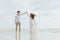 Romantic time loving couple dance on the beach. Love travel concept. Honeymoon concept