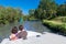 Romantic vacation, holiday travel on barge boat in canal, happy couple on river cruise in houseboat