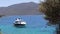 Romantic view on sailboat cruising calm sea in bay in evening.