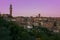 Romantic view of Siena medieval city at sunset, Tuscany