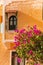 Romantic vintage arabic window and bougainvillea flowers