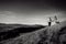 Romantic wedding couple walking in the mountains. Black and white photo