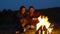 Romantic Weekend. Couple In Love Near Bonfire In Nature