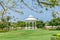 Romantic white arbor in the meadow