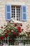 romantic window with red roses