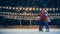 Romantic Winter Snowy Evening: Ice Skating Couple Having Fun, Step on Ice Rink and Start Dancing