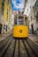 Romantic yellow tramway - main symbol of Lisbon, Portugal