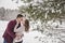 Romantic young couple outdoors in winter