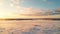 Romanticized Winter Sunset: Aerial Photography Of Snow Covered Field