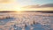 Romanticized Winter Sunset Over Snowy Field In Rural Finland