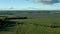 Romantsevo hills in Tula oblast under bright blue sky drone aerial shot