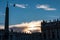 Rome - Bird flying with scenic sunset view from St Peter square in the Vatican City, Rome, Italy. Silhouette of statues