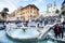 Rome center monuments. Old boat fountain and tourists, Spanish steps. Italy