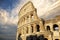 Rome Coliseum colosseum with beautiful dramatic sky on the bac