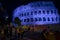 Rome coliseum facade with blue light projection to commemorate international epilepsy day
