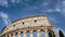 Rome colosseum detail architecture landmark in city center timelapse 4K with beautiful rolling clouds.