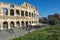 Rome, Italy, 25.12.2019: Colosseum or gladiator Arena, famous stony ancient architecture. Flavian Amphitheatre