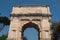 Rome, Italy - Arch of Titus ruins along the Via Sacra in the Roman Forum. Ancient structure celebrating fall of Jerusalem.