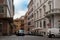 Rome, Italy - August 21, 2018: Typical old Roman narrow street. Lovely sidewalk cafÃ© with umbrellas.