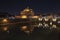 Rome Italy. Beautiful view of Castel Sant`Angelo and the bridge at night with reflections on the Tiber river