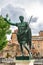 Rome, Italy. Bronze statue of Roman Emperor Augustus Caesar on Via dei Fori Imperiali street in the city