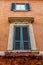 Rome, Italy. Closed windows and wooden shutters from outside homes/ houses/ apartments/ residences in Europe.