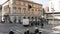 rome, italy - dec 2, 2015: rome italy historical building shot from moving vehicle with mopeds scooters car 32 v