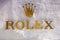 ROME, ITALY - DECEMBER 10, 2020 : Rolex logo on street. Rolex is a manufacturer of high-quality, luxury wristwatches
