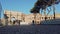 Rome, Italy - December 13th 2020: View of the Arch of Constantine and Coliseum with few tourists