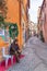 Rome, Italy - December 17, 2019: Elderly senior Italian man in street cafe in historic city