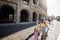 Rome, Italy - July 27, 2022: Family visit Colosseum or Coliseum, Rome, Italy, Europe. It is top travel attraction