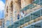 ROME, ITALY - JUNE 13, 2015: Mens working outside Roman Coliseum, reconstruction hand works