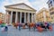 ROME, ITALY - JUNE 13, 2015: Pantheon of Agrippa in the center of Rome, horses pulling the red wagon outside in the