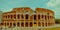 ROME, ITALY - JUNE 13, 2015: Roman Coliseum view, located in the center of the city and considered one of the seven