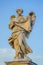 ROME, ITALY - JUNE 13, 2015: Stone sculture in Rome, an angel with wings and a dress holding a piece of cloth