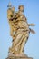ROME, ITALY - JUNE 13, 2015: Stone sculture in Rome, female angel with wings and a big nice dress, little bird in her