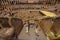 ROME, ITALY - JUNE 13, 2015: Tourists visiting the Roman Coliseum, inside view from the enter to the top