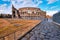 ROME, ITALY - JUNE 2014: Tourists visit Colosseum. The city attracts 15 million people annually