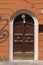 Rome, Italy - June 28, 2010: A dark wooden door in Rome