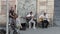 Rome Italy, June - 28, 2020. street musicians play under a high-rise building, on the driveway. near the metro Furio