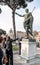 Rome, Italy March 2022: Bronze statue of Emperor Augustus Gaius Iulius on a blu sky background